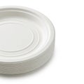 Stack of White Biodegradable Disposable Plates on White Background paper plates eco-friendly Royalty Free Stock Photo