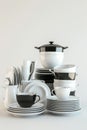 A stack of white and black dishes and cups. Perfect for kitchen or dining concepts Royalty Free Stock Photo