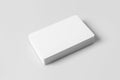 Stack of  white blank credit cards mockup on white background Royalty Free Stock Photo