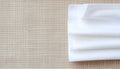 Stack of White Blank Paper Sheets on Beige Textured Fabric Background Royalty Free Stock Photo