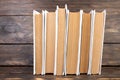 Stack of white books. Education background. Back to school. Book, hardback books on wooden table. Education business concept. Copy Royalty Free Stock Photo