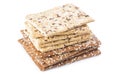 A stack of white and brown sesame crackers