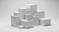 Stack of white cardboard boxes arranged in a geometric formation on plain background. concept of minimalist packaging, industrial Royalty Free Stock Photo