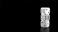 Stack of white casino dice on black background Royalty Free Stock Photo