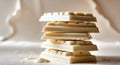 Stack of White Chocolate Bars Showing a Few Drippings on the Surface, Closeup Shot. Royalty Free Stock Photo