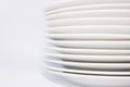 Stack of white dinner plates Royalty Free Stock Photo