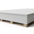 Stack of White Drywall Sheets on a Wooden Shipping Pallet plasterboard gypsum board Royalty Free Stock Photo
