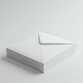 A stack of white envelopes neatly arranged on a white surface. Each Royalty Free Stock Photo