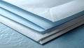 Stack of White Envelopes on Textured Blue Background with Soft Lighting Royalty Free Stock Photo