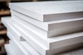 Stack of white extruded polystyrene sheets insulative material for buildings