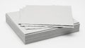Stack of white and grey textured paper sheets on a white background Royalty Free Stock Photo