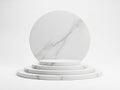 A stack of white marble coasters with a large round marble placemat on top Royalty Free Stock Photo