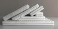 A stack of white mattresses on top of each other Royalty Free Stock Photo