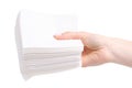 Stack white napkins in hand