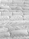 A stack of white new clean duvets in store Royalty Free Stock Photo