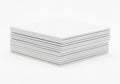 Stack of white notepads with grid lines Royalty Free Stock Photo