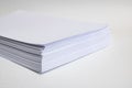 Stack of white paper for printer on gray background Royalty Free Stock Photo