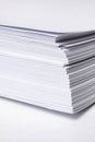 Stack of white paper for printer on gray background Royalty Free Stock Photo