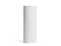 Stack of white paper rolls neatly arranged against a white background Royalty Free Stock Photo