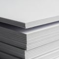 Stack of white paper sheets arranged neatly, demonstrating a close-up side view Royalty Free Stock Photo
