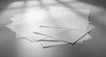 Stack of white paper sheets casting shadows on a gray surface blank Royalty Free Stock Photo