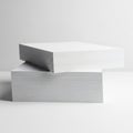Stack of white paper sheets on a clean white background for office or stationery use Royalty Free Stock Photo