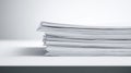 Stack of white paper sheets on a clean white surface Royalty Free Stock Photo