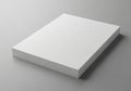 A stack of white paper sheets on a gray background with a slight shadow effect Royalty Free Stock Photo