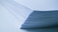 Stack of white paper sheets on light surface close up Royalty Free Stock Photo