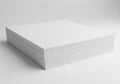 Stack of white paper sheets neatly arranged on a flat surface Royalty Free Stock Photo