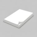 A stack of white paper sheets is neatly arranged on a gray background Royalty Free Stock Photo