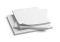 Stack of white paper sheets on a plain white background for office or school use Royalty Free Stock Photo
