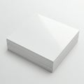 A stack of white paper sheets neatly piled on a flat surface. The paper is bright and Royalty Free Stock Photo