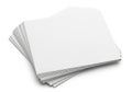 Stack of white paper sheets on a plain white background for office or school use Royalty Free Stock Photo