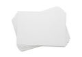 Stack of white paper sheets on a plain white background for office or school use Royalty Free Stock Photo