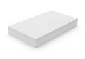 Stack of white paper sheets on a plain white background for office use Royalty Free Stock Photo