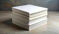 Stack of White Paper Sheets on Textured Surface Royalty Free Stock Photo