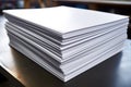 stack of white papers ready for printing flyers Royalty Free Stock Photo