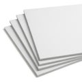 Stack of white papers or sheets on white background with subtle shadows Royalty Free Stock Photo