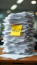 Stack of white papers with yellow \