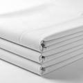 Stack of white pillowcases isolated on white background Royalty Free Stock Photo