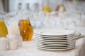 A stack of white plates on the table Royalty Free Stock Photo