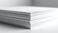 Stack of white paper sheets on a table Royalty Free Stock Photo