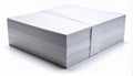 Stack of White Printer Paper with Soft Shadow on White Background Royalty Free Stock Photo