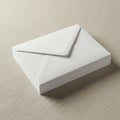 Stack of white, rectangular paper envelopes with pointed flaps, neatly arranged on a Royalty Free Stock Photo