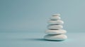 Stack of white smooth stones on a blue background