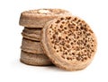 Stack of wholemeal crumpets isolated on white background