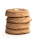 Stack of wholemeal crumpets isolated on white background