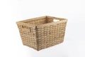 Stack of wicker straw osier handmade baskets different size and pattern at isolated white background for home storage. A set of Royalty Free Stock Photo