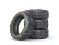 Stack of winter tires on a white background